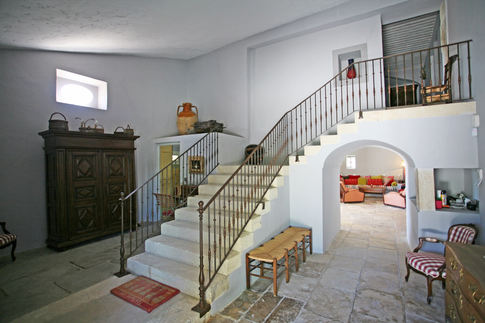 For sale in Luberon, near a superb hilltop village, elegant house with independent studio, park, views and swimming pool