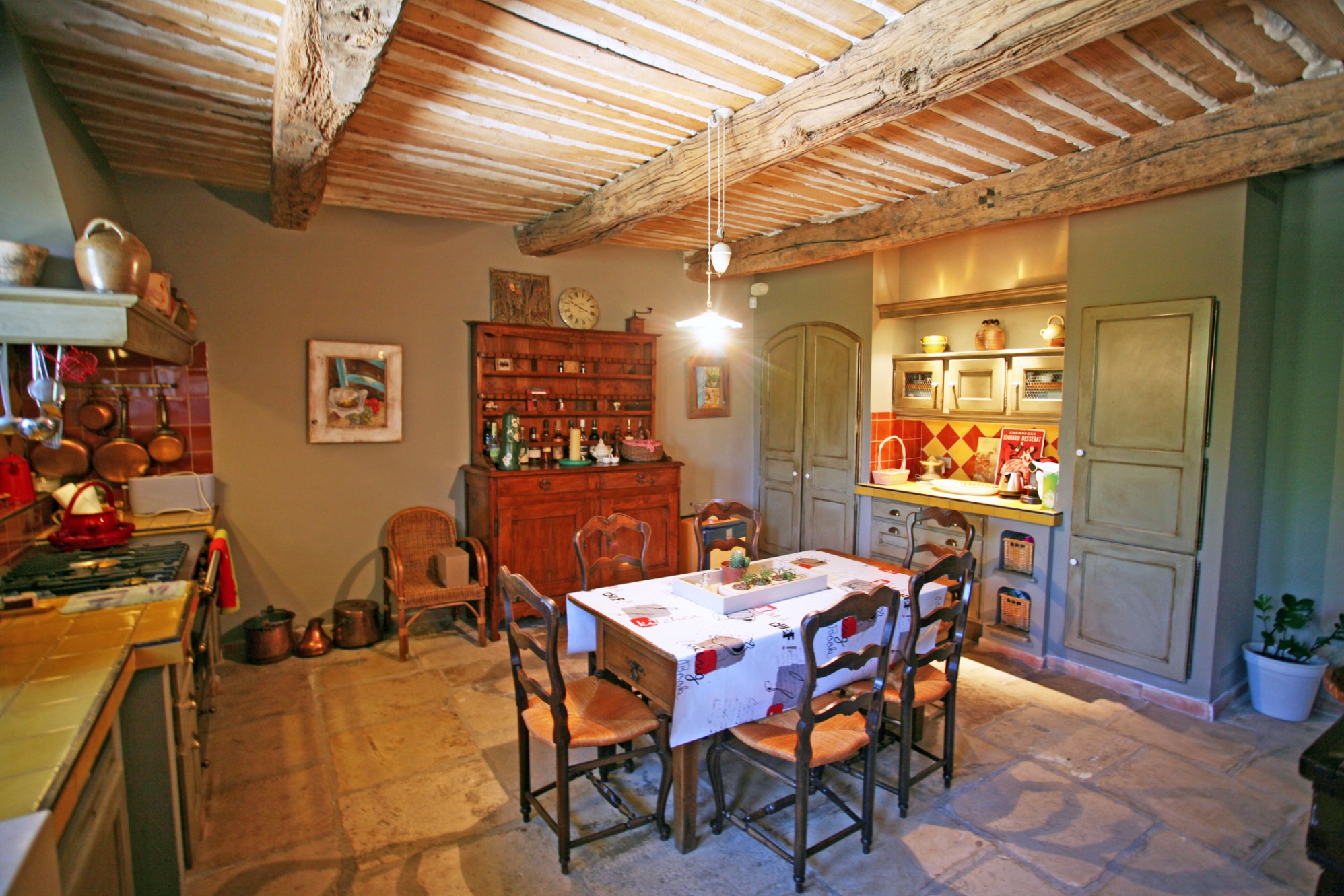 For sale in Luberon, near a superb hilltop village, elegant house with independent studio, park, views and swimming pool