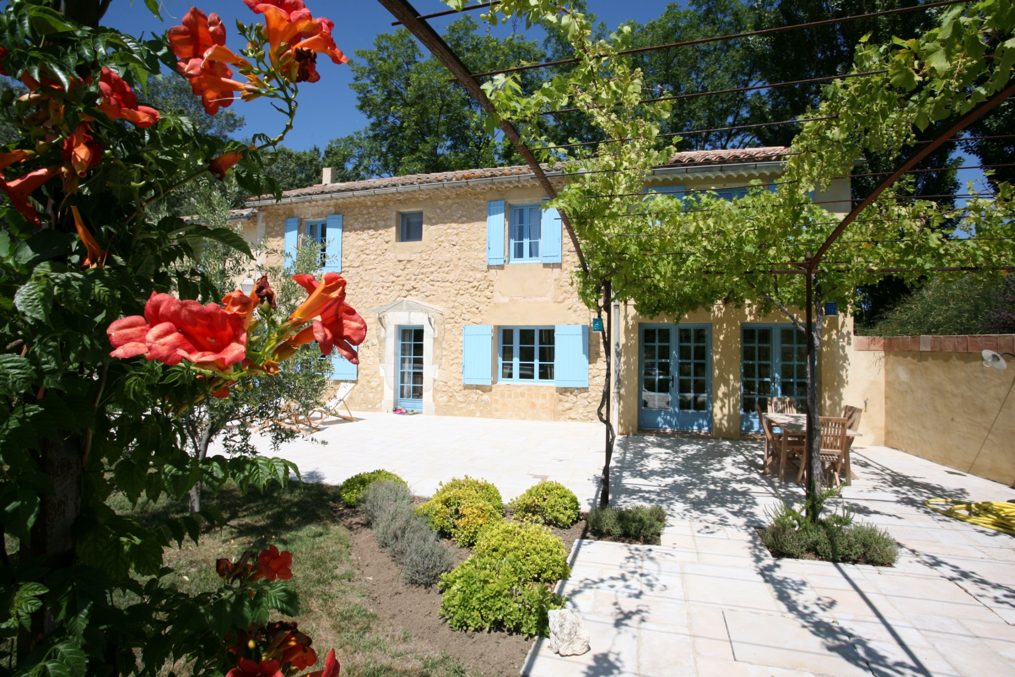 Provence, for sale, close to the Luberon, a tastefully restored farmhouse with terraces and pool