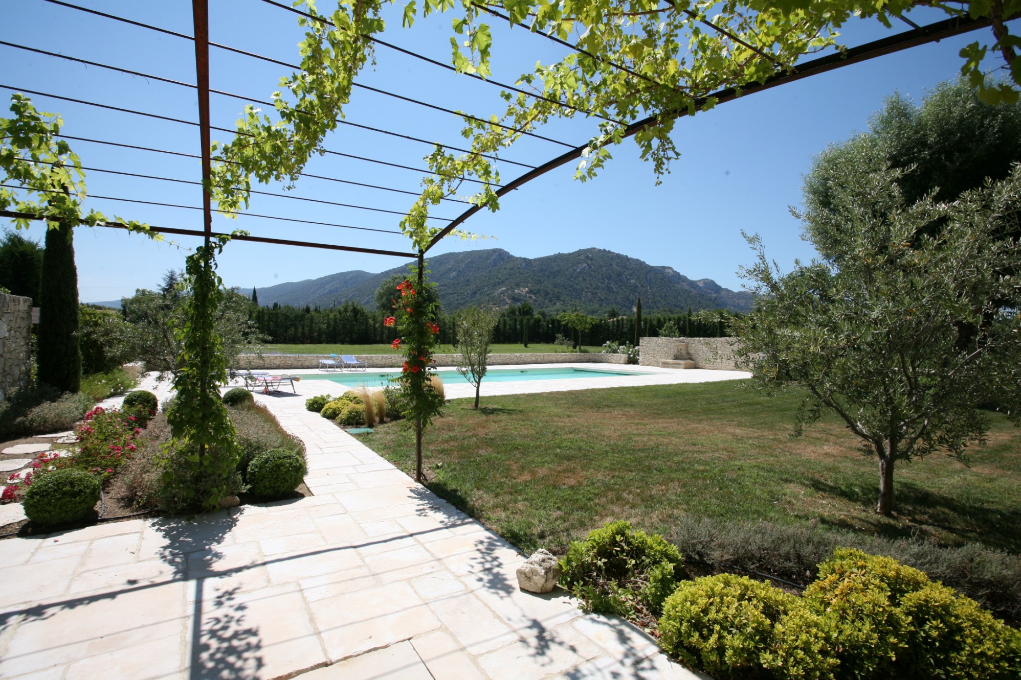 Provence, for sale, close to the Luberon, a tastefully restored farmhouse with terraces and pool