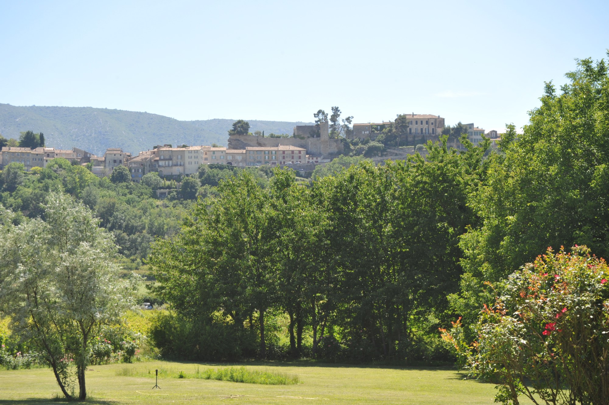 In the heart of the Luberon regional park, for sale, an authentic renovated farmhouse with swimming pool for sale, on more than 1.7 hectares of land with stunning views on a hilltop village