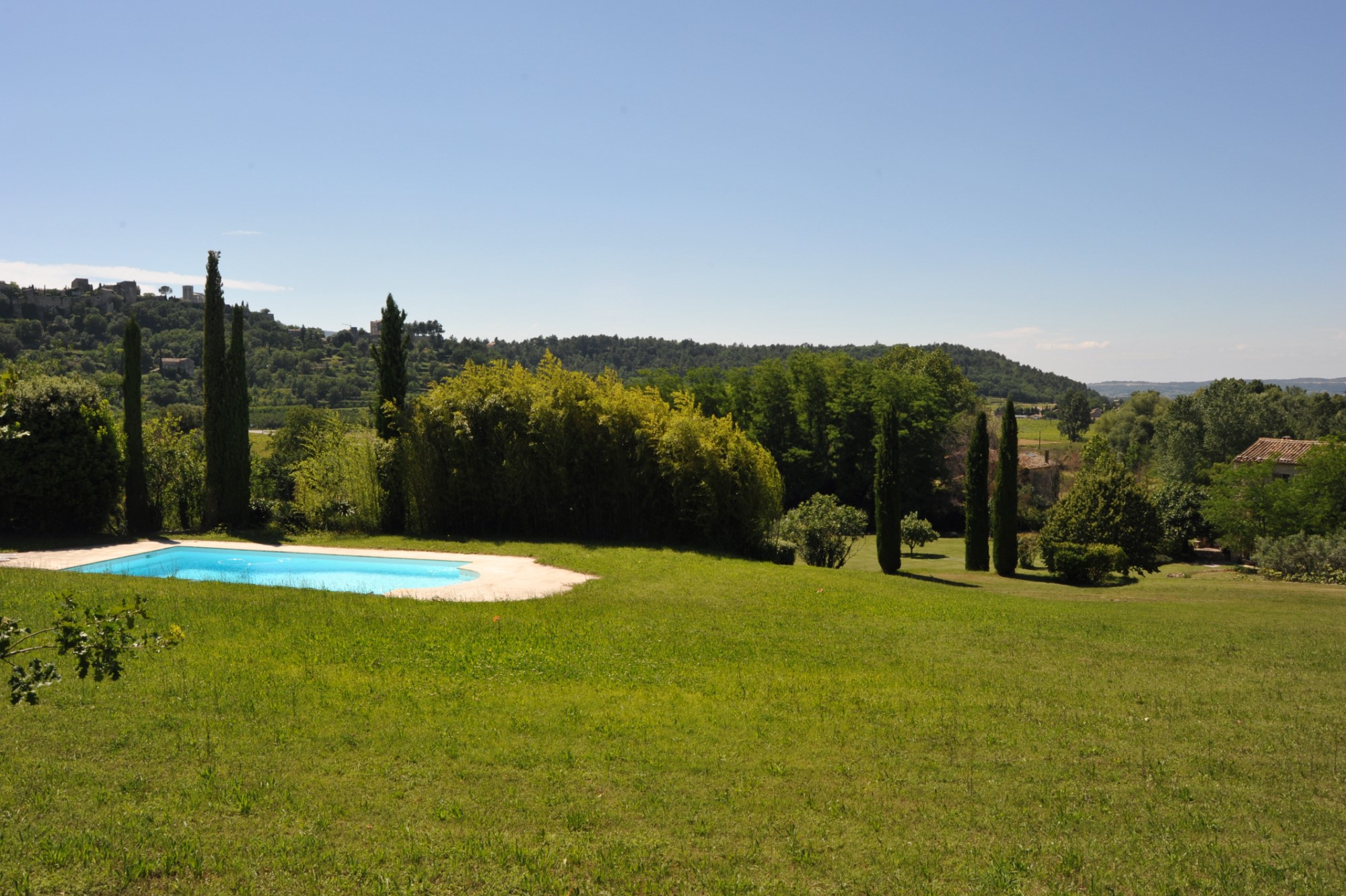 In the heart of the Luberon regional park, for sale, an authentic renovated farmhouse with swimming pool for sale, on more than 1.7 hectares of land with stunning views on a hilltop village