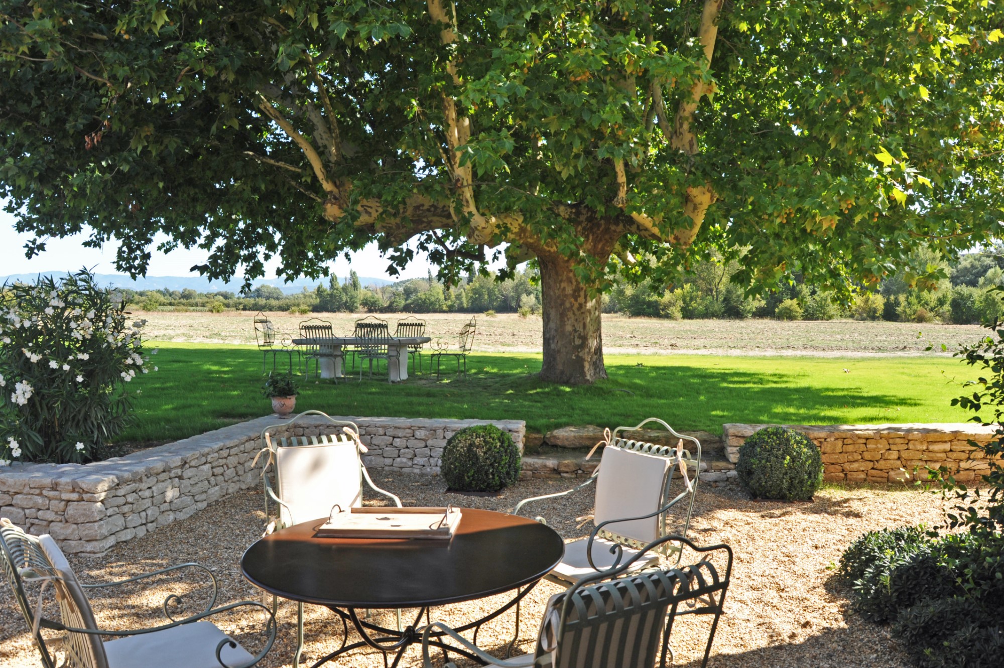 For sale near Roussillon, restored stone farmhouse with pool on 2.7 hectares of land
