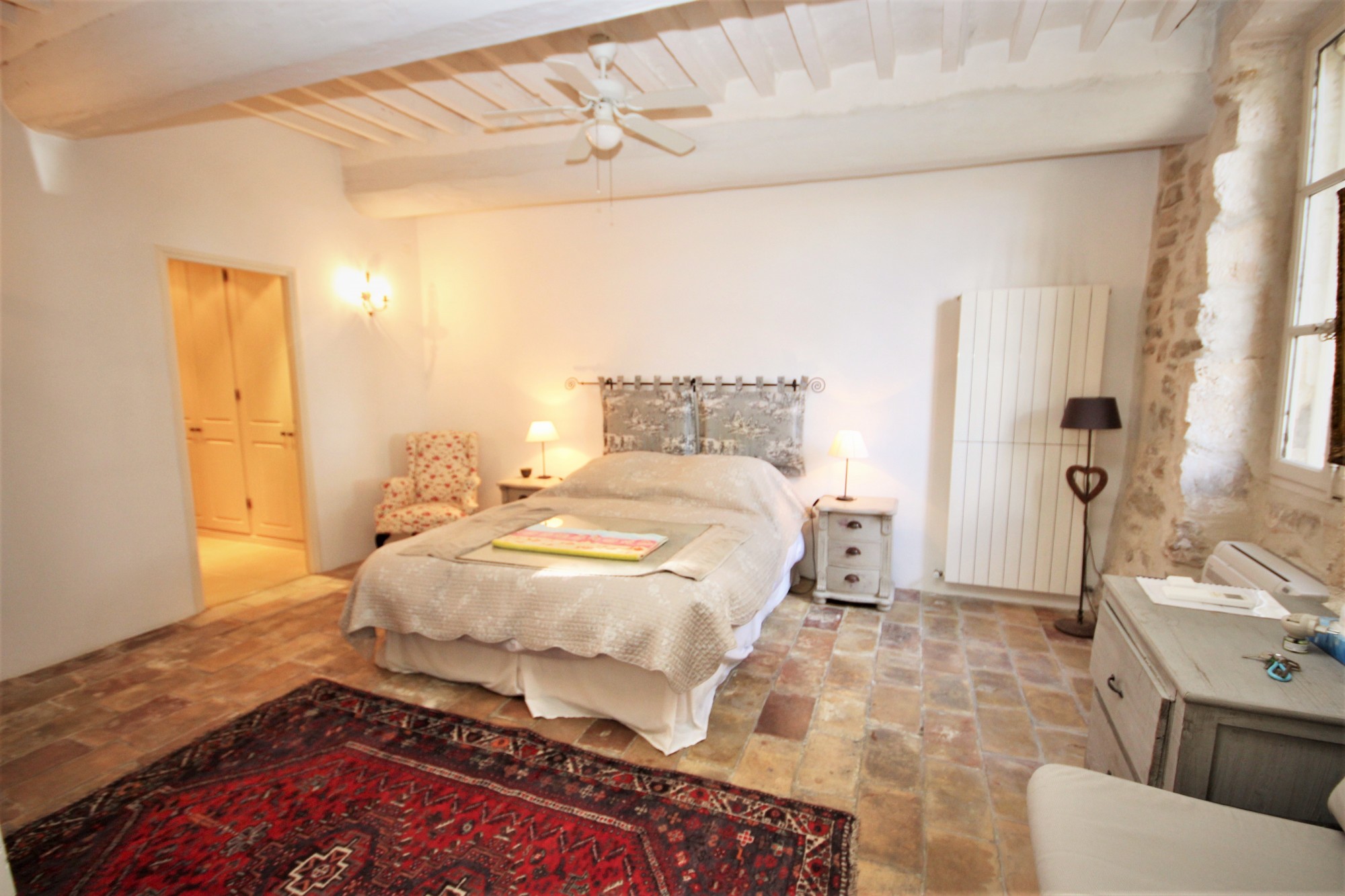 XVIII th century stone farmhouse in the center of a famous village