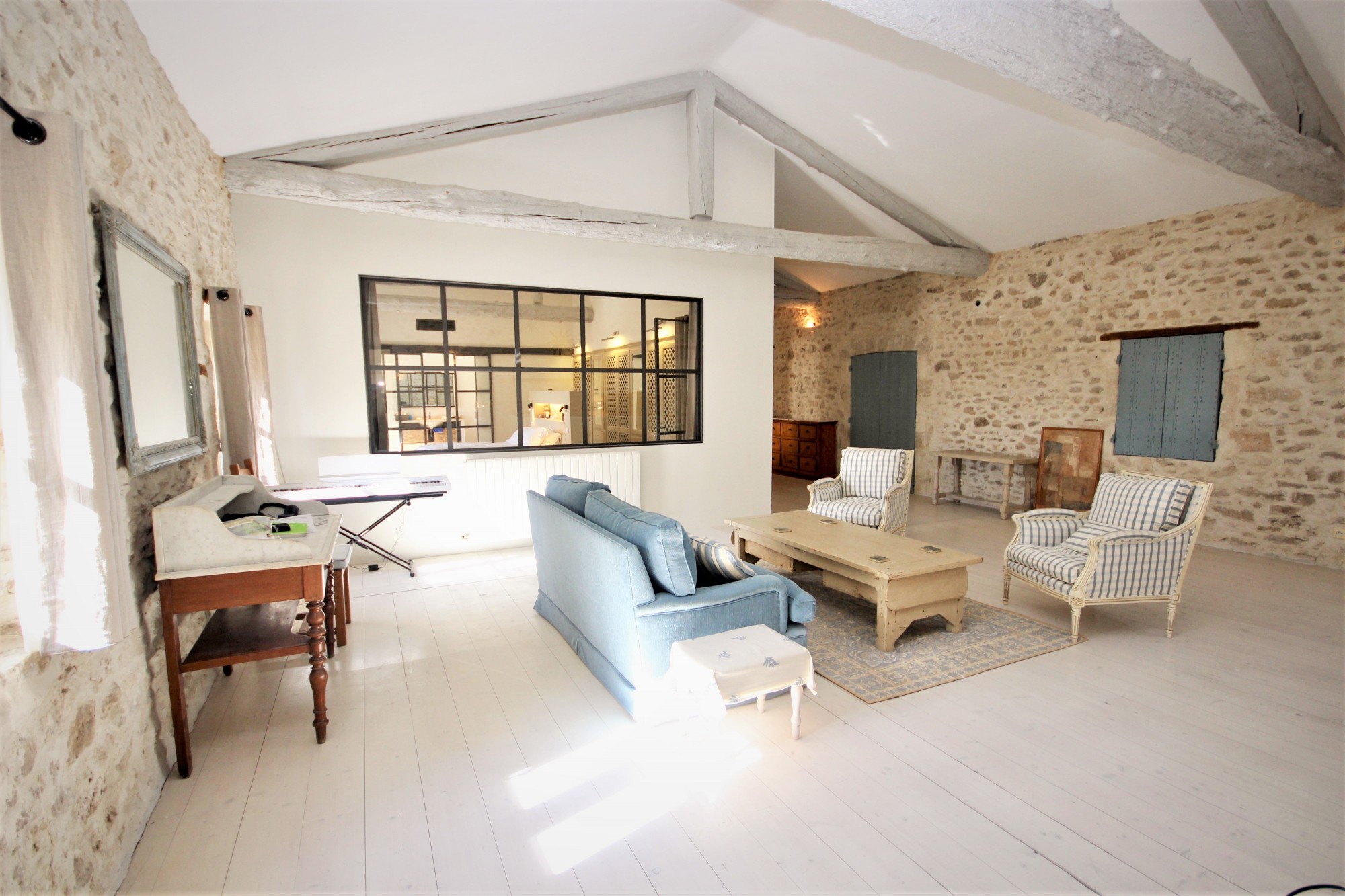 XVIII th century stone farmhouse in the center of a famous village