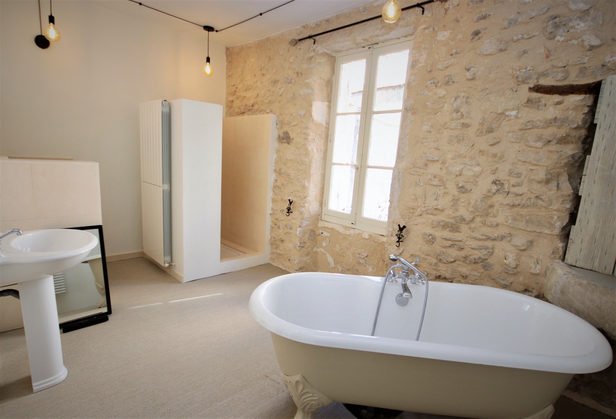 XVIII th century stone farmhouse in the center of a famous village